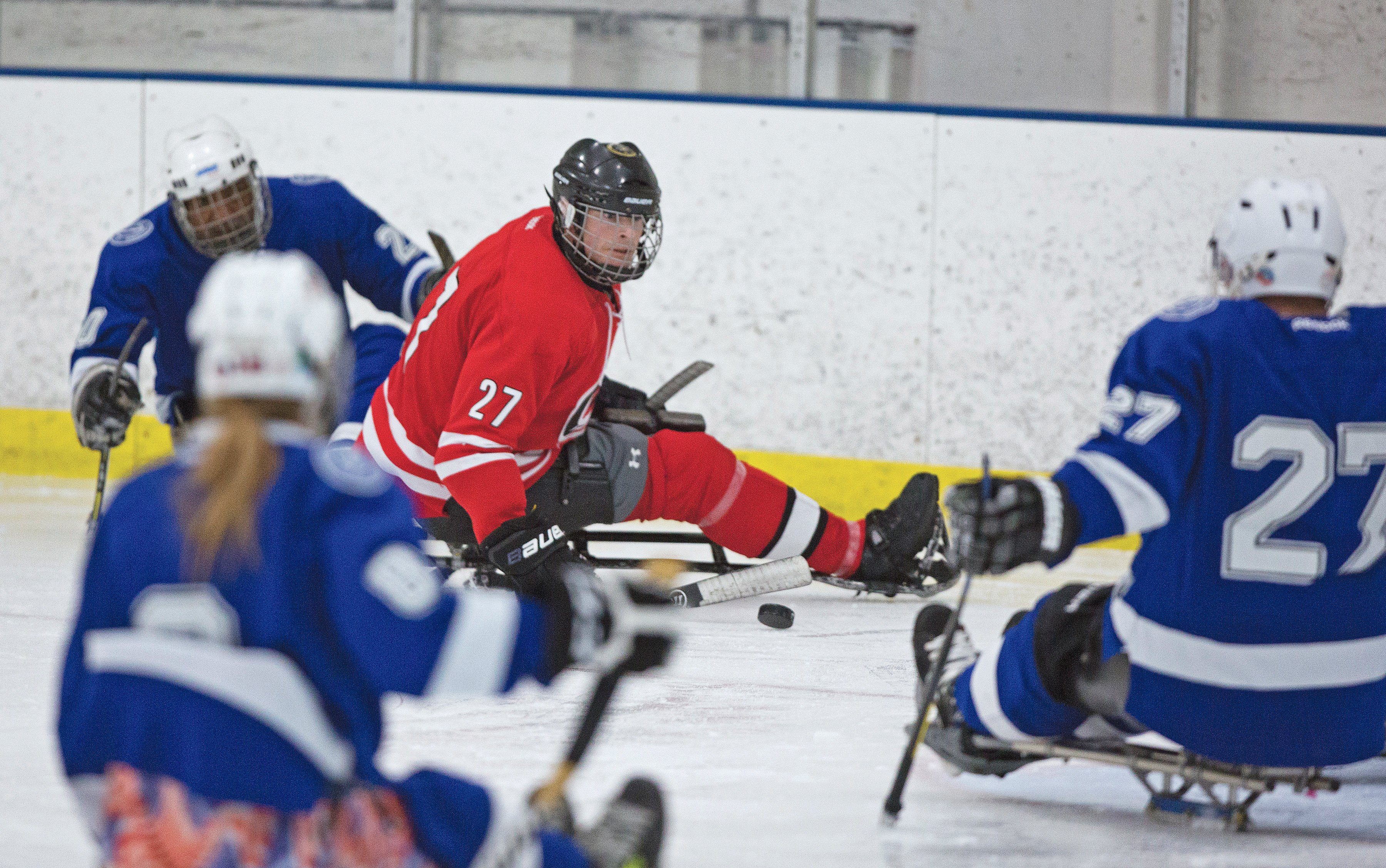 Sled Hockey for Players With Mobility Impairments