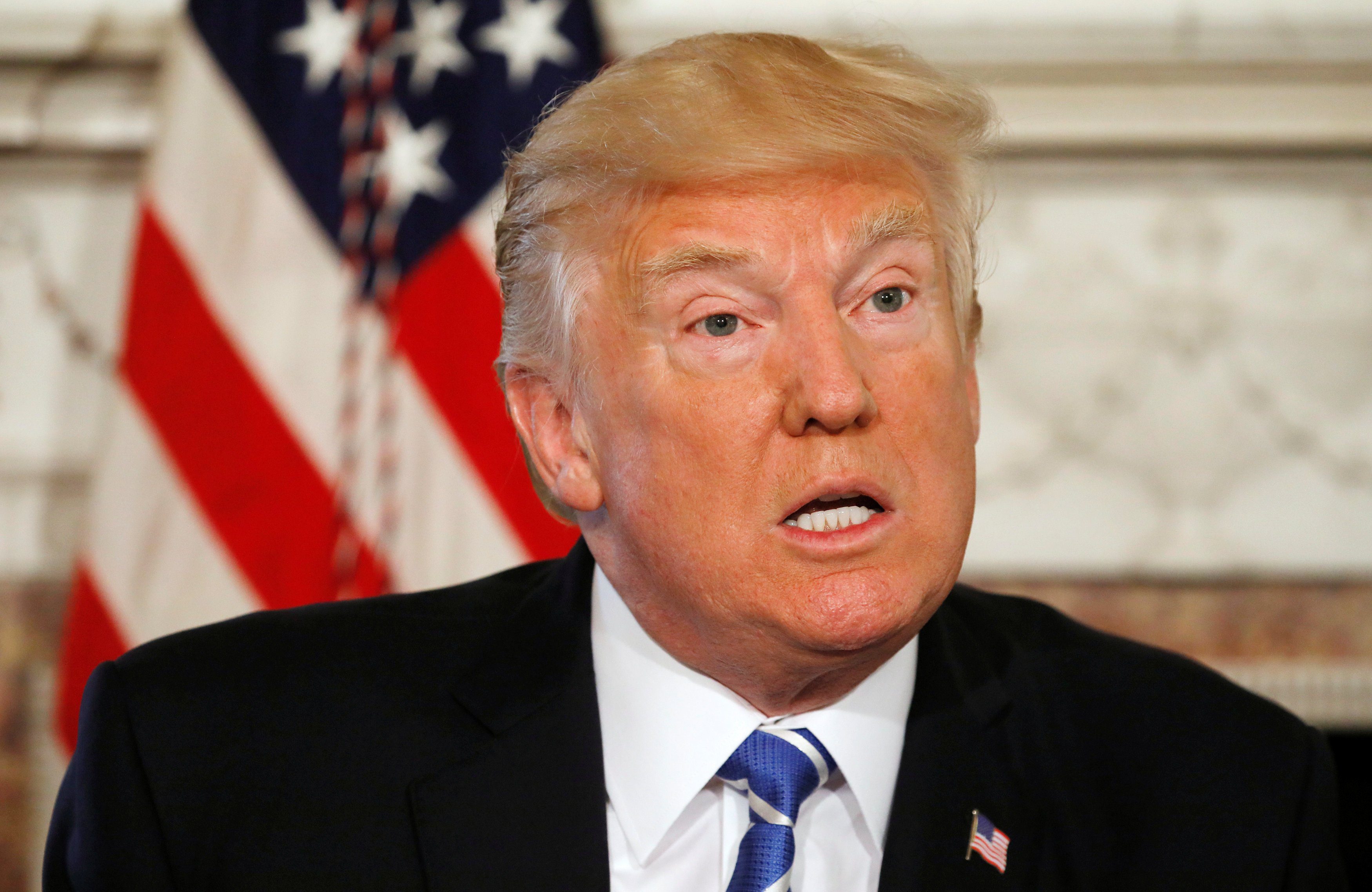 U.s. President Trump Speaks To Reporters At His Golf Estate In 