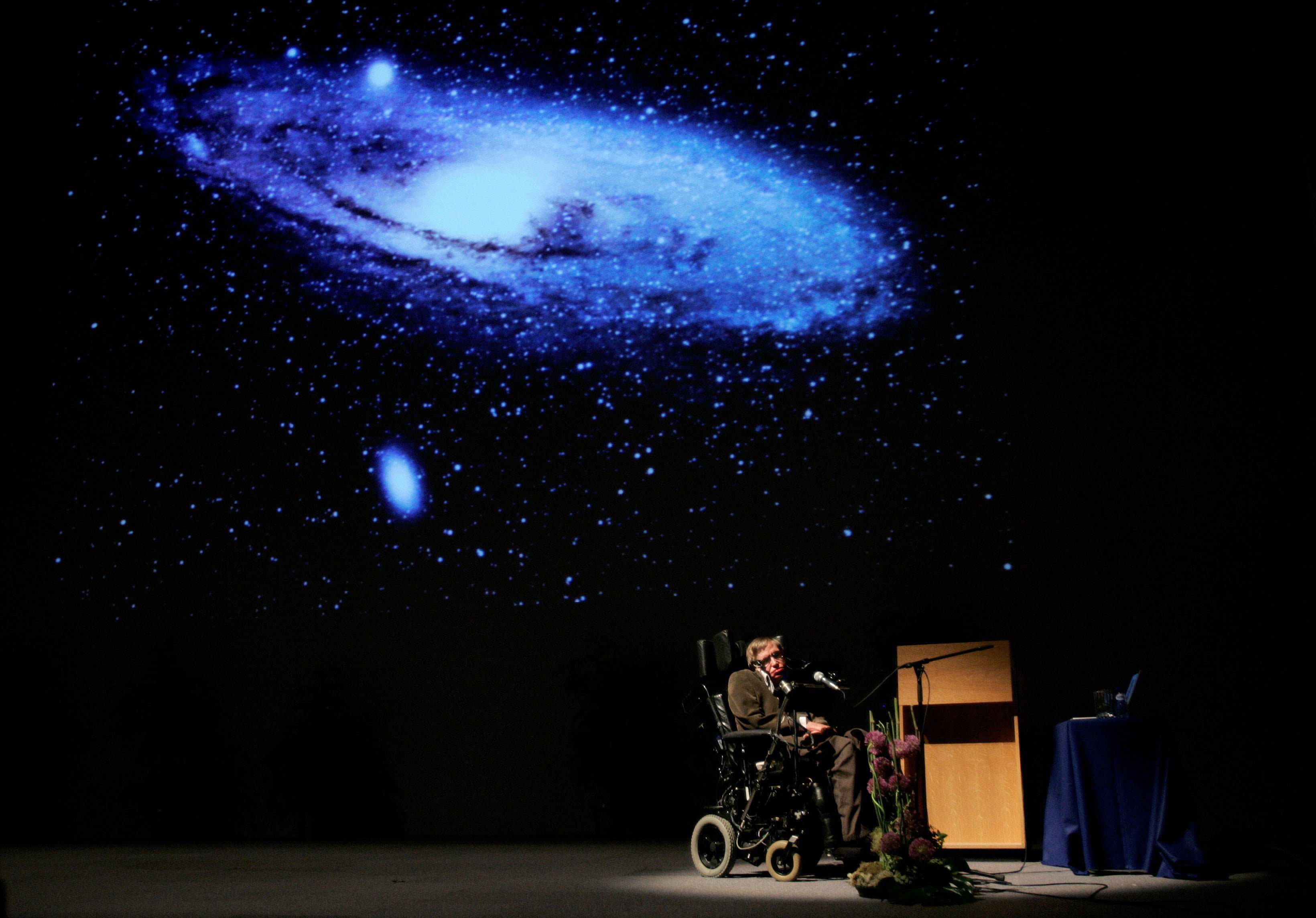 FILE PHOTO: British physicist Stephen Hawking delivers a lecture on “The Origin of the Universe” in Brussels