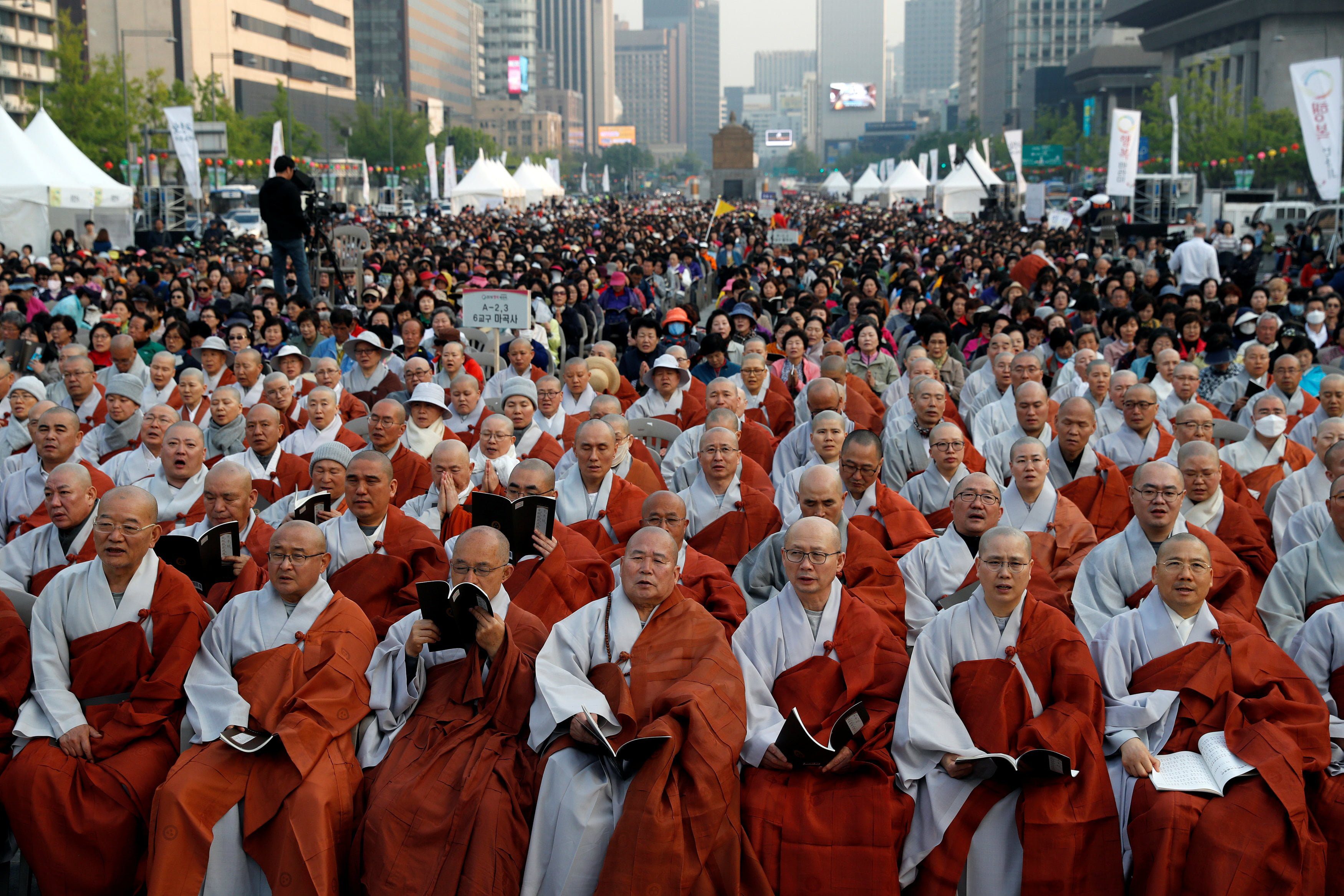 Buddhist monks, nuns and people attend a prayer service wishing for a successful inter-Korean summit in Seoul, South Korea