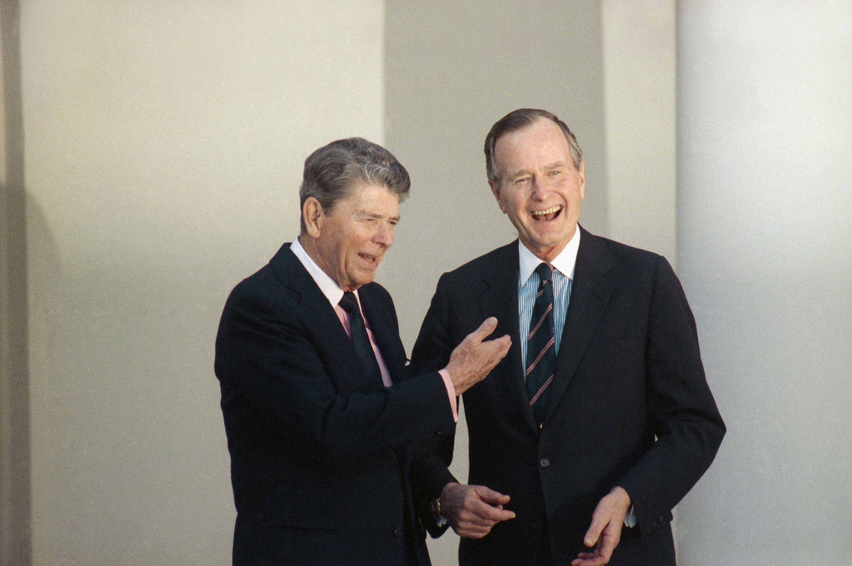 Ronald  Reagan and George H. Bush