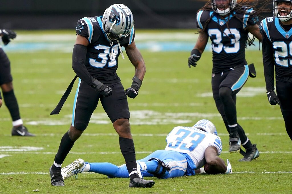 Walker wins first NFL start as Panthers blank Lions 20-0