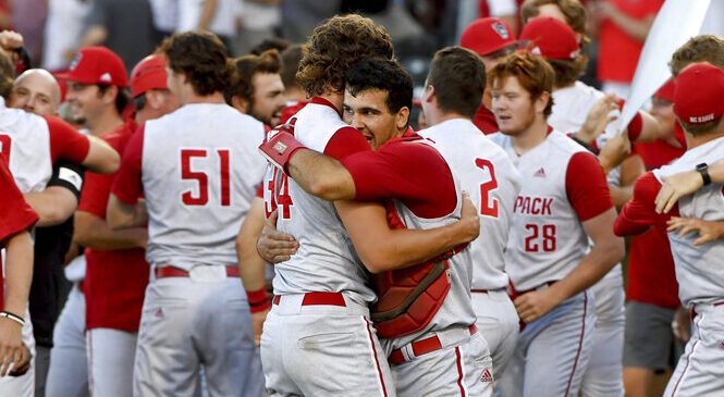 NC State knocks out No. 1 Arkansas on Torres; homer in 9th