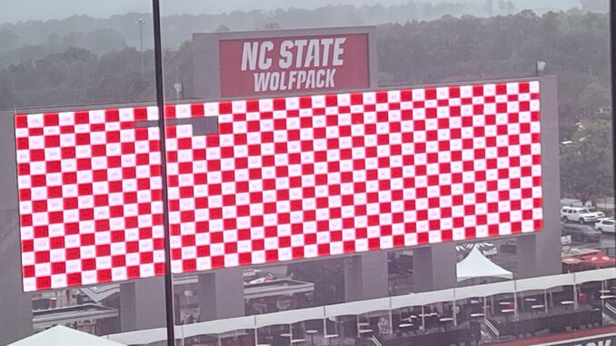 Select panels on NC State's new video board wouldn't reboot after a close-by lightning strike momentarily knocked out the display during its 9/9/2023 home opener against Notre Dame. (Ryan Henkel / North State Journal)
