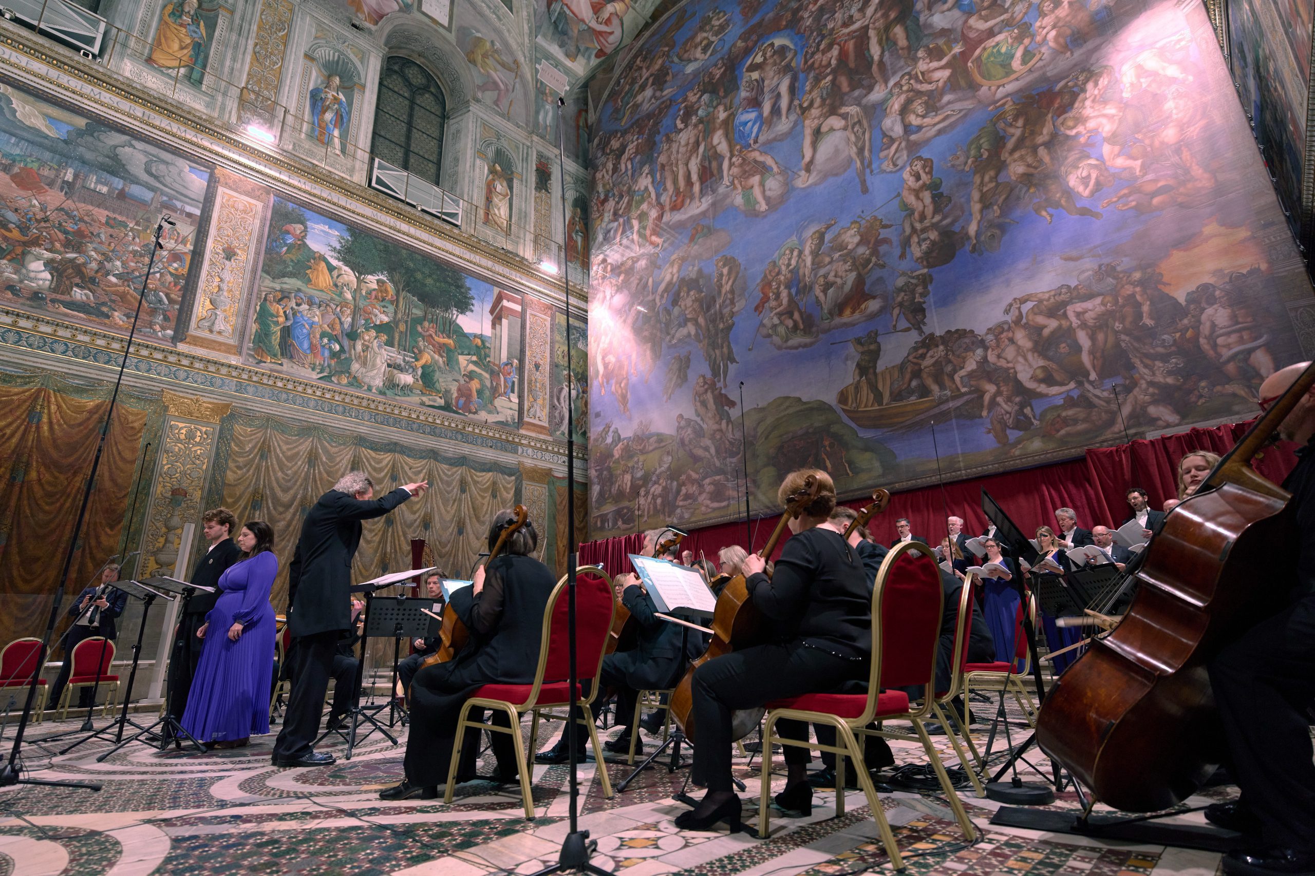 Rare look inside Sistine Chapel for private concert about angel encounters